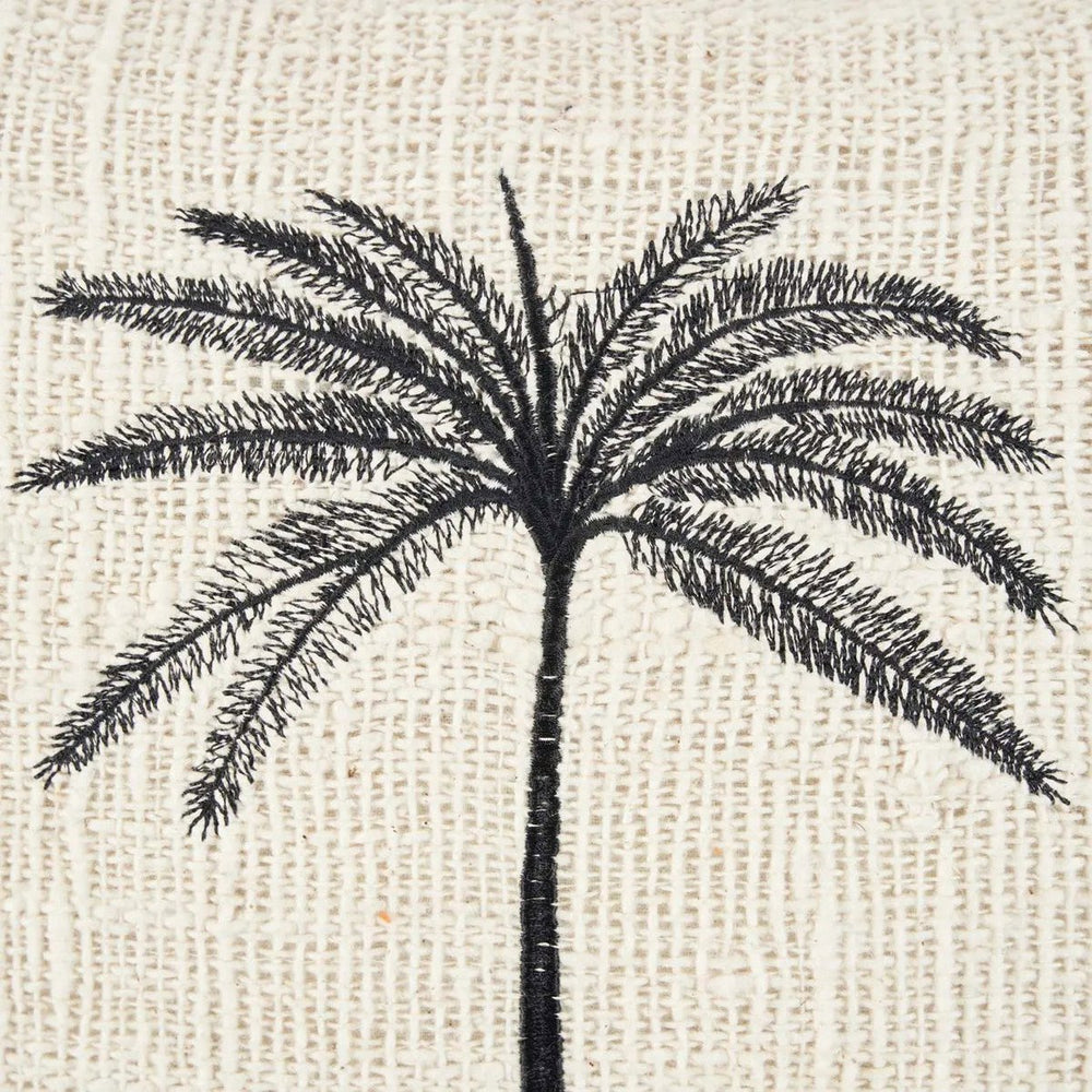 Black woven cotton cushion cover with palm leaf design
