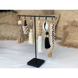 Black and beige cowrie shell keychain with wooden bead accent
