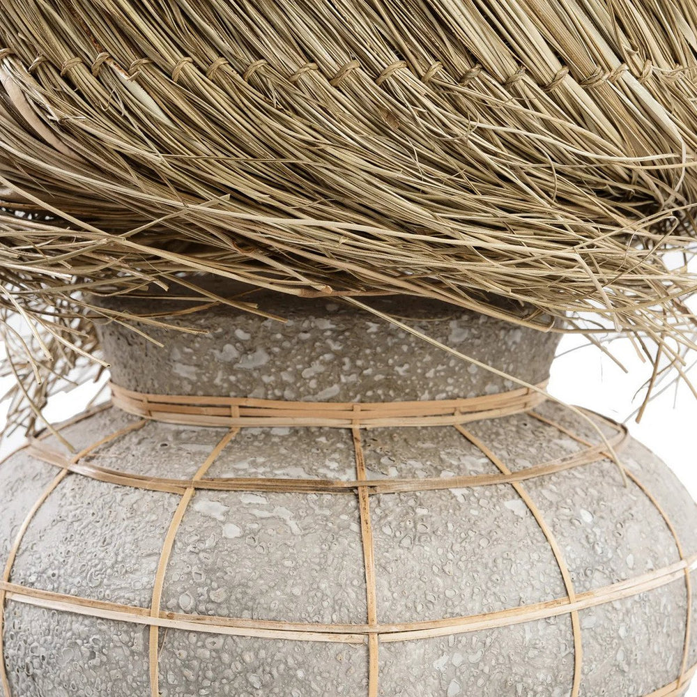 Beige and grey terracotta table lamp with rattan grid and fringed grass shade