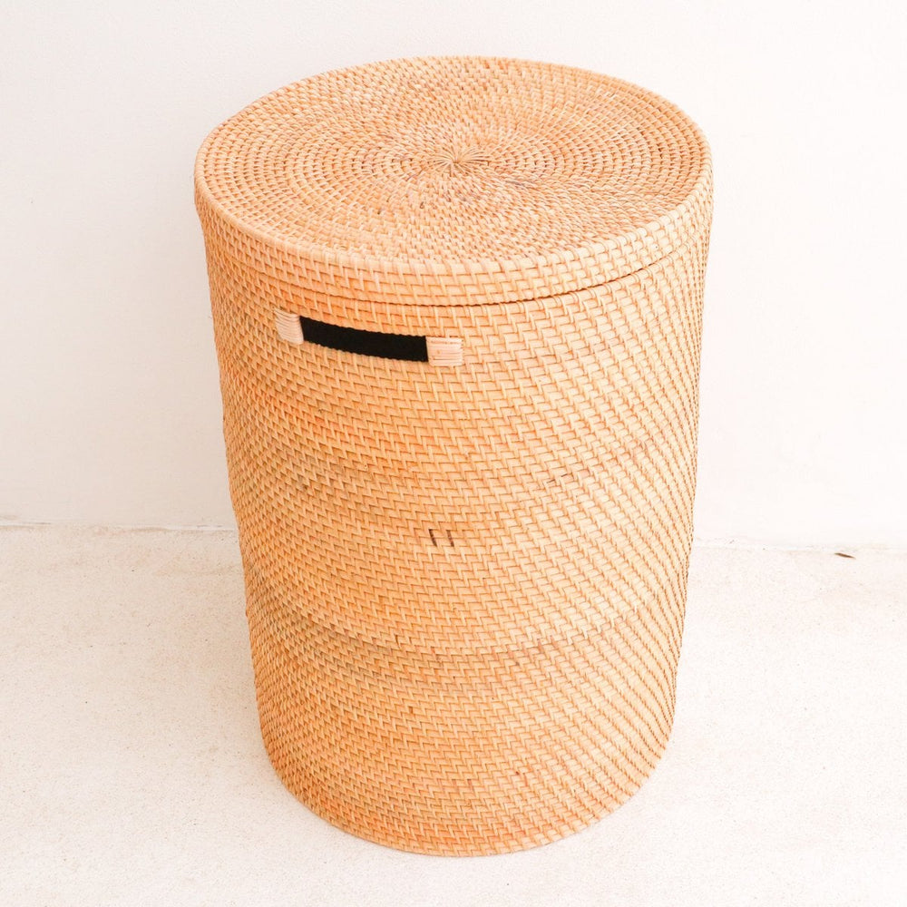Beige woven rattan laundry basket with lid