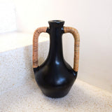 Black clay bottle vase with rattan-wrapped handles