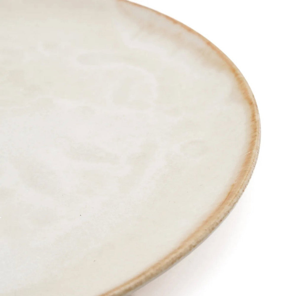 White stoneware salad plate with brown rim