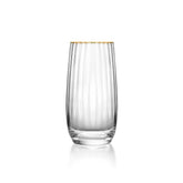 Clear glass with gold rim on a white background