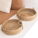Beige woven seagrass round serving tray with handles