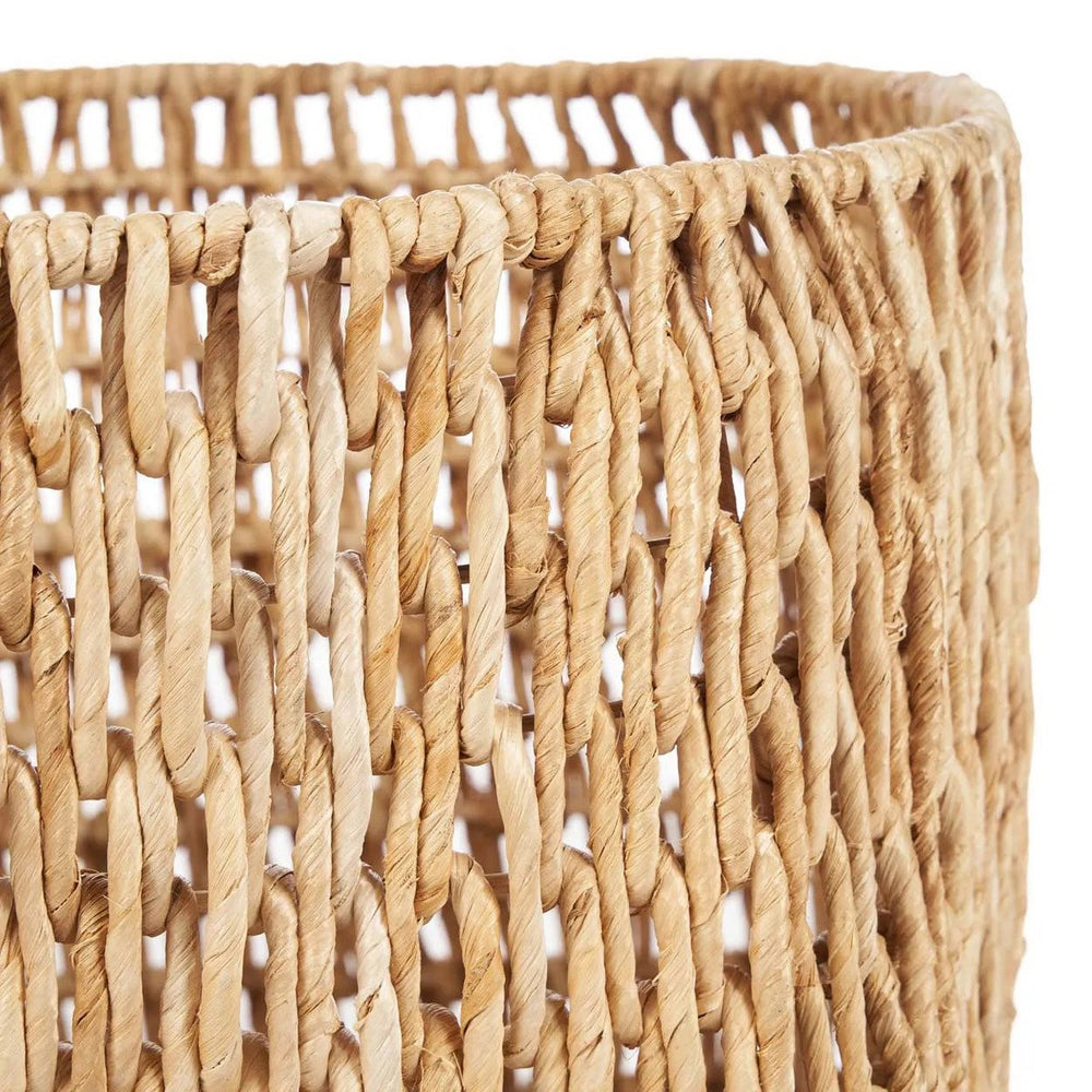 Natural palm leaf basket on a white background