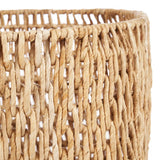 Natural palm leaf basket on a white background