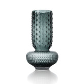 Textured glass vase on a white background