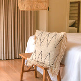 Black and white handwoven cotton cushion cover with zigzag pattern and fringes