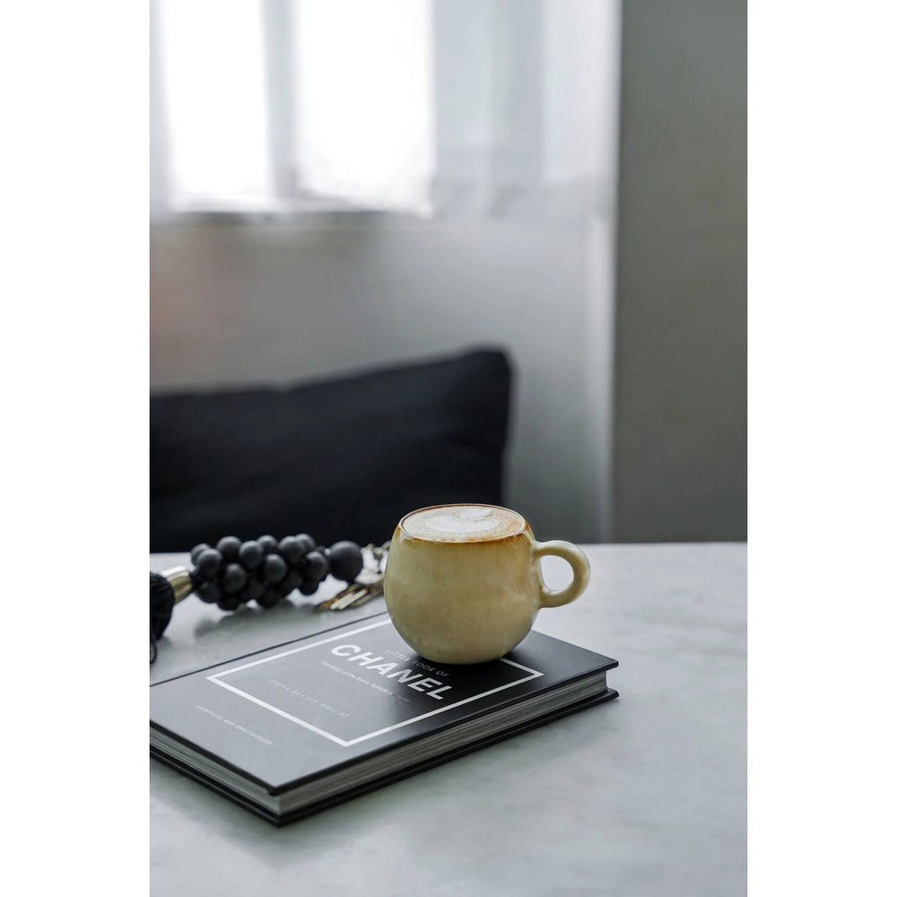 Beige stoneware espresso cup