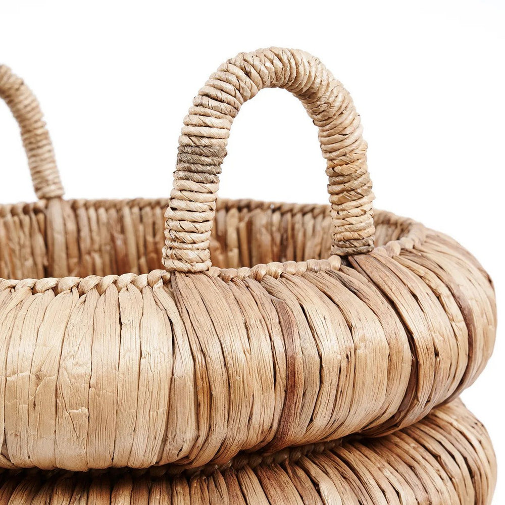 Beige woven seagrass basket with handles