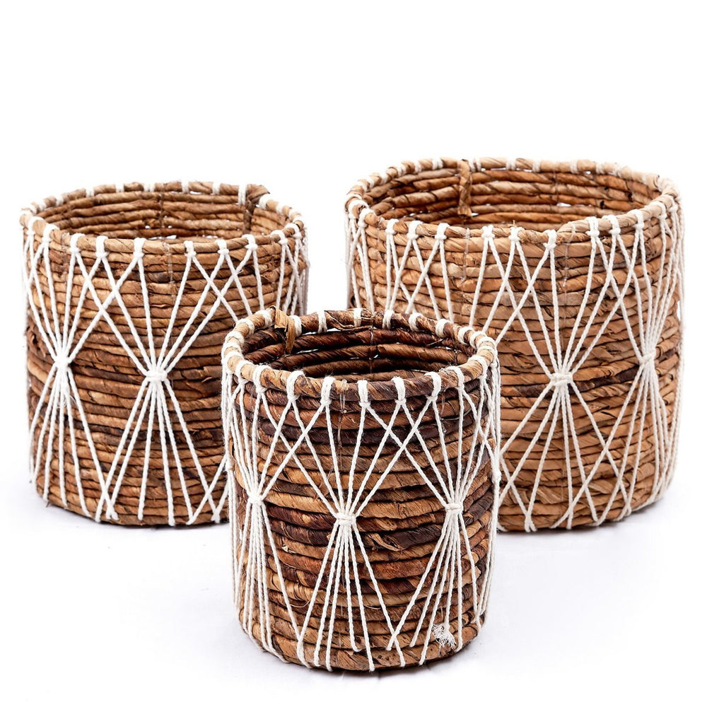 Brown and white woven banana fibre storage basket with cotton macramé lacing
