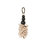 Black and beige cowrie shell keychain with wooden bead accent