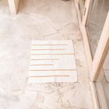 Handgewebter Baumwollteppich Gianyar – Badezimmermatte Weiß Braun 64x51 cm