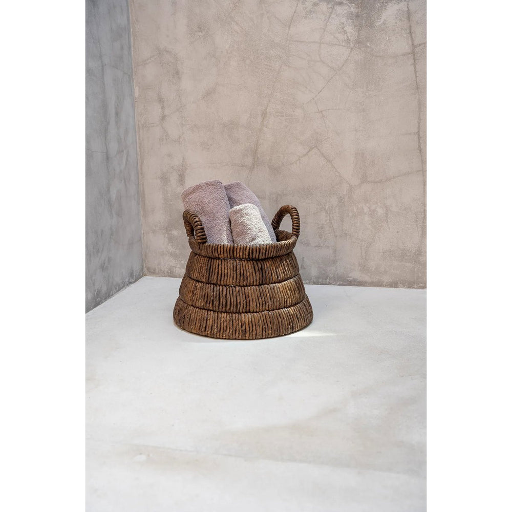Brown woven banana leaf basket with handles