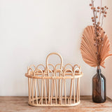 Beige rattan newspaper basket with two compartments
