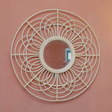 Beige rattan round wall mirror