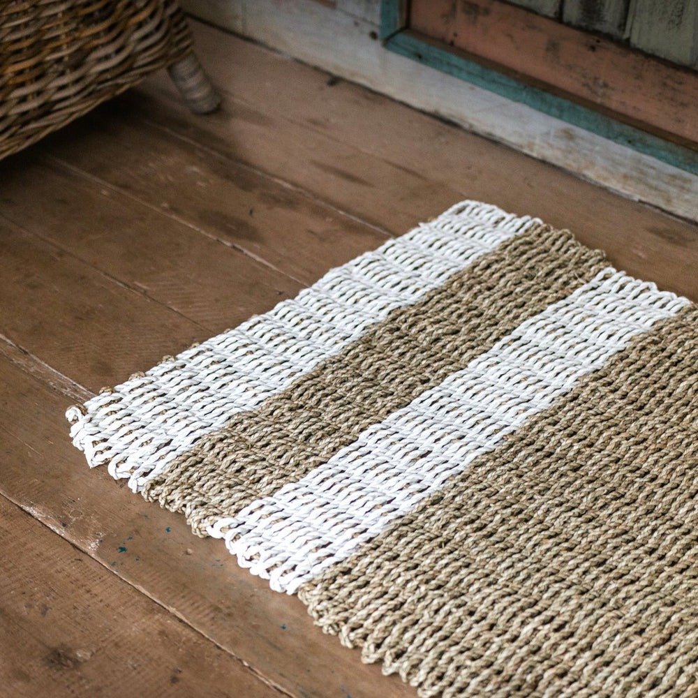 Beige and white striped seagrass rug