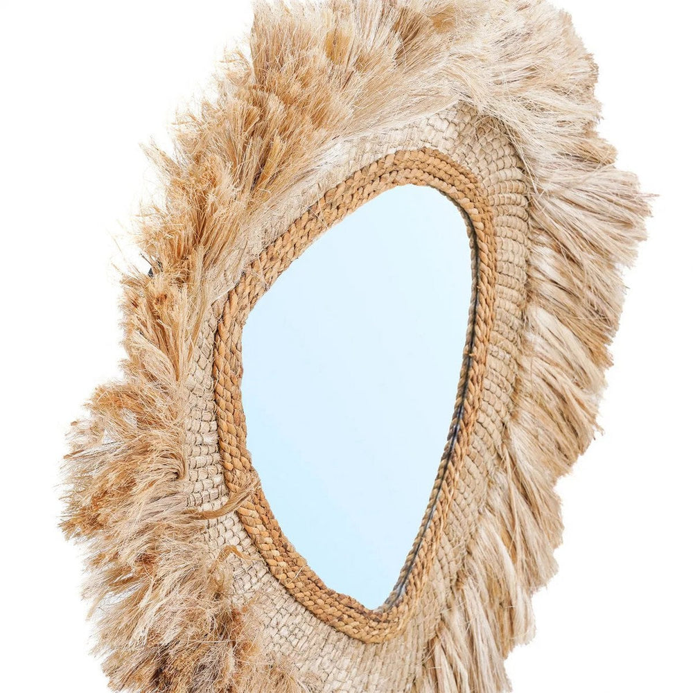 Beige round grass-framed mirror