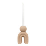 Beige pendant light with a white candle on a white background