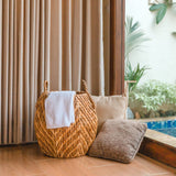 Beige and brown woven water hyacinth basket with zig zag pattern