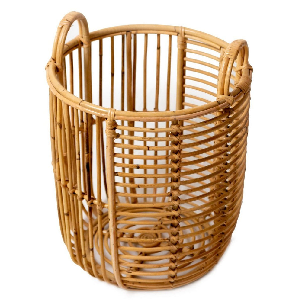 Beige woven rattan laundry basket with handles