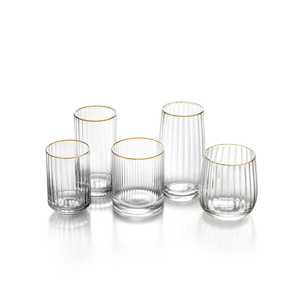 Set of six clear glasses with gold rims on a white background