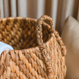 Beige and brown woven water hyacinth basket with zig zag pattern