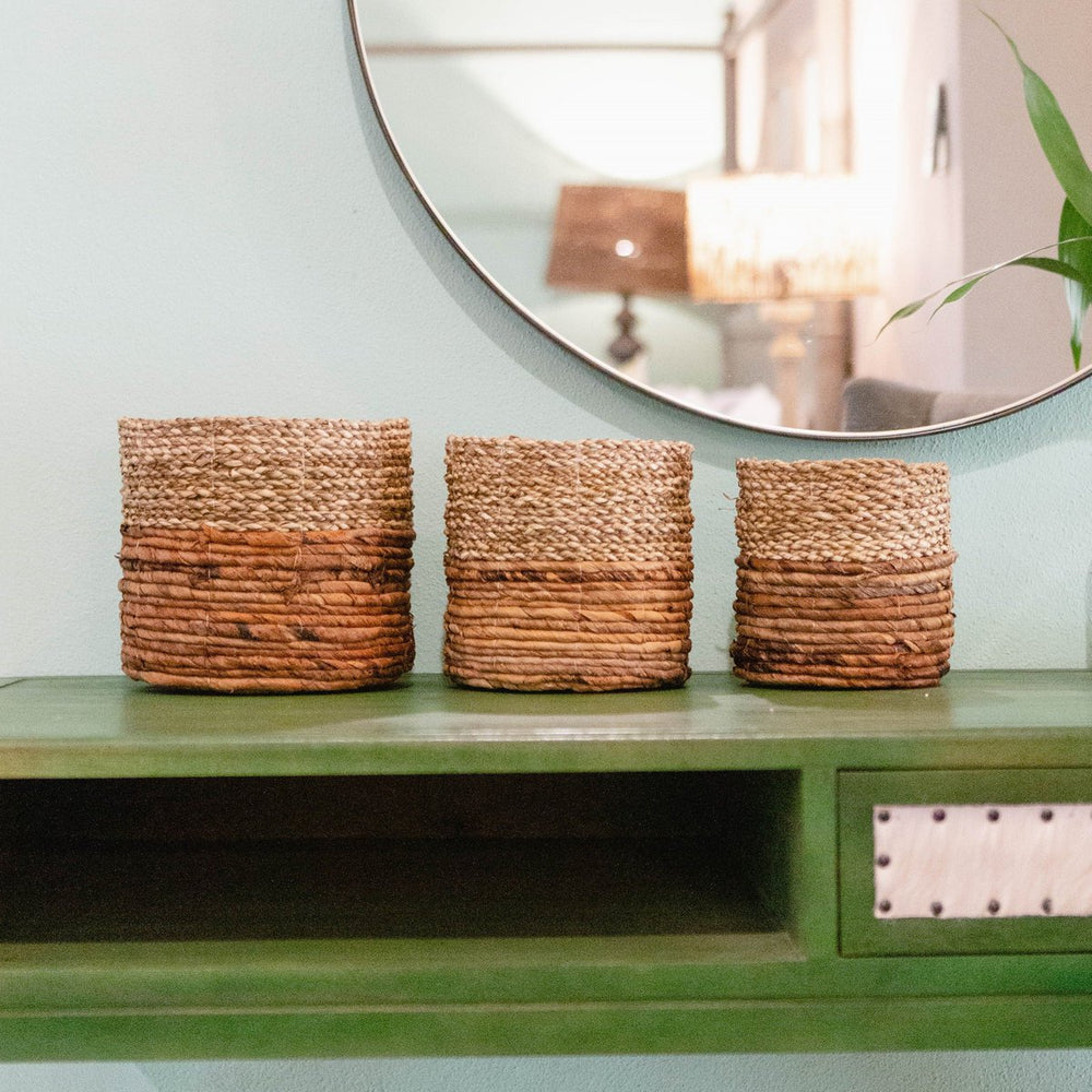 Two-tone brown and beige woven seagrass and banana fibre basket