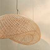 Beige woven rattan lampshade with metal frame