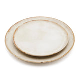 White stoneware dinner plate with burnt-umber rim