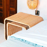 Beige rattan side table with metal frame