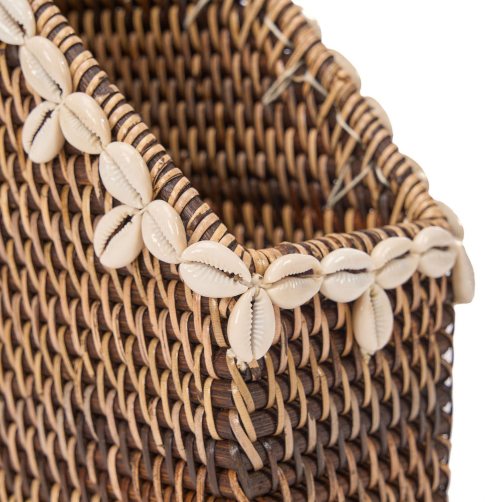 Natural brown rattan organizer with shell edge accents