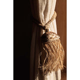 Natural raffia tassel with shell accent