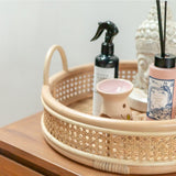 Beige round rattan serving tray