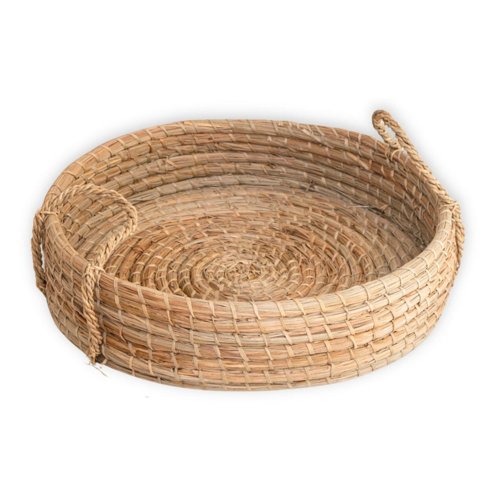 Beige woven seagrass round serving tray with handles