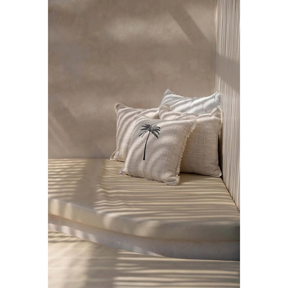 Black woven cotton cushion cover with palm leaf design