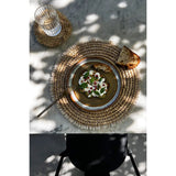 Natural raffia placemat with cowrie shells