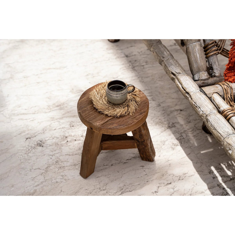 Natural raffia coaster with fringed edge