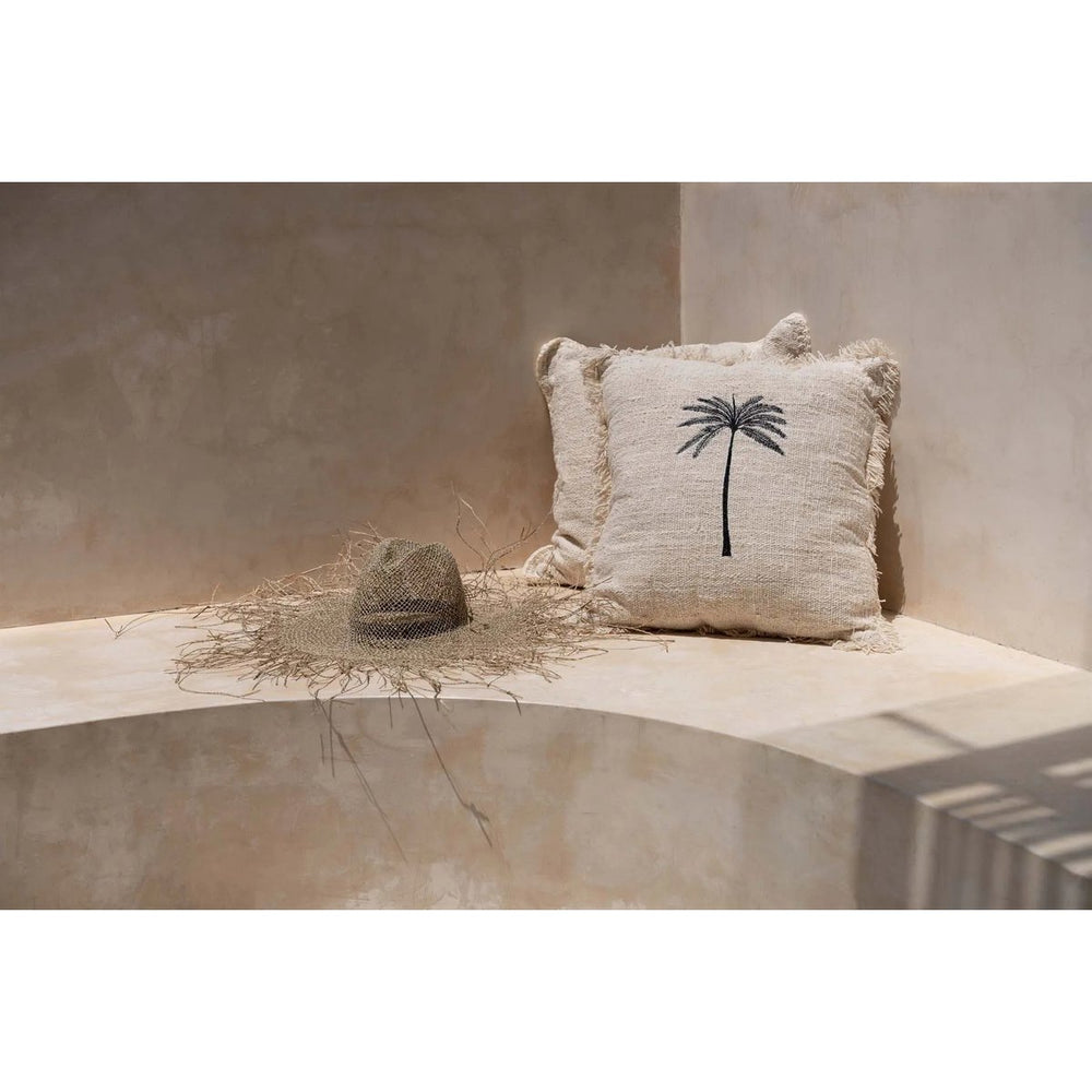 Black woven cotton cushion cover with palm leaf design
