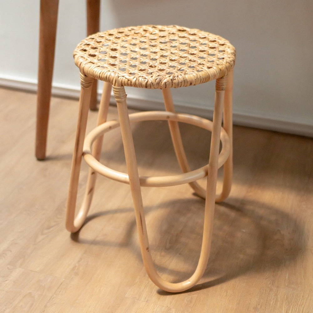 Natural rattan stool with woven seating surface