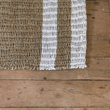 Beige and white striped seagrass rug