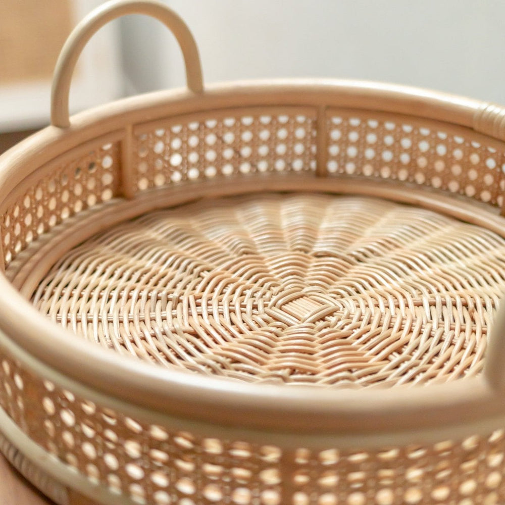 Beige round rattan serving tray