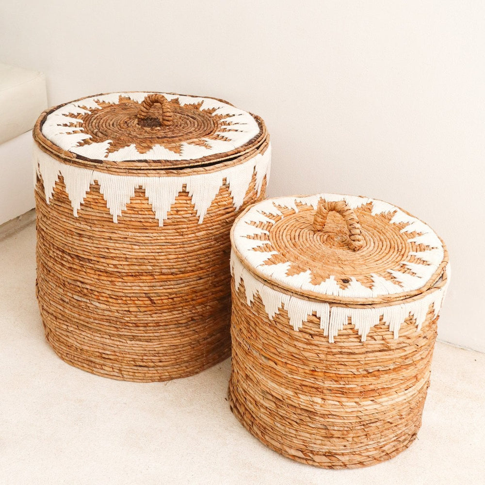 Brown woven banana fibre laundry basket with lid and white cotton macrame pattern
