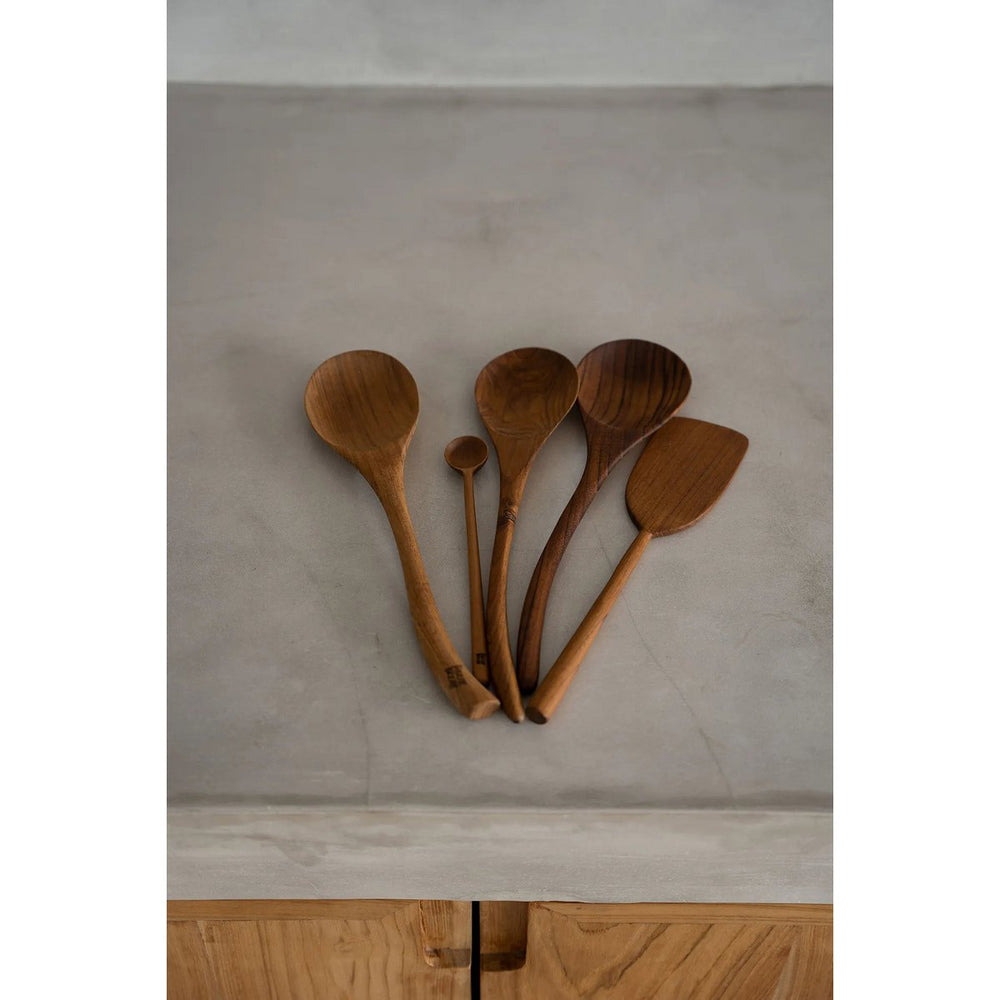 Brown teak wood serving spoon with curved handle
