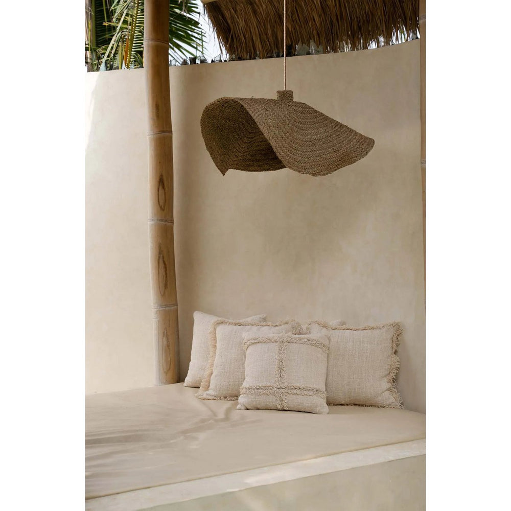 Natural cotton cushion cover with travel-inspired pattern