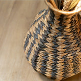 Black and natural woven water hyacinth vase