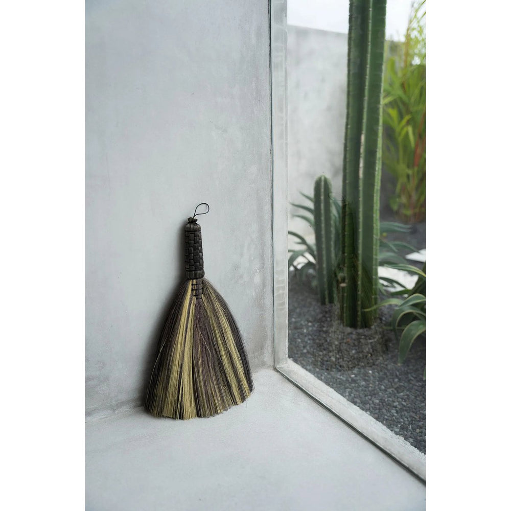 Black natural grass sweeping brush